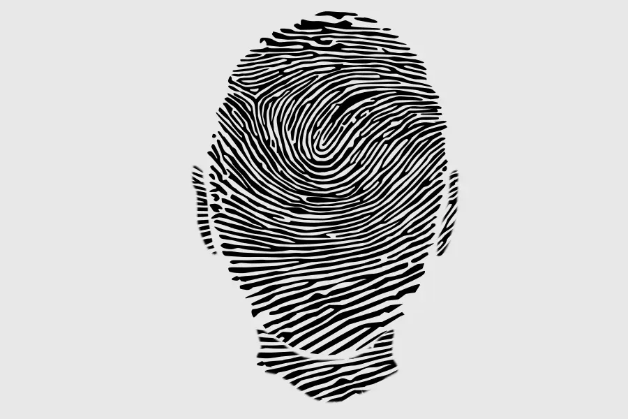 Thumbprint in the shape of a head.