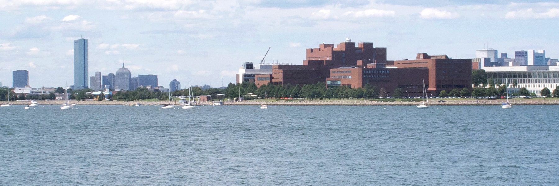 view of UMass Boston campus from Dorchester Bay harbor