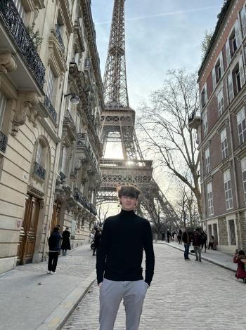 Stephen standing in front of the Eifel tower